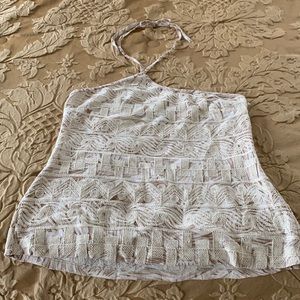 Beige and white patterned halter top.